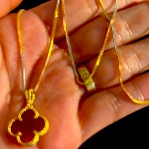 Pure gold and the chain is 3 color